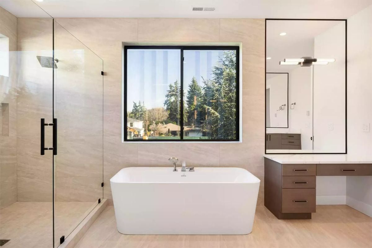 Freestanding Tub, Glass Shower, and a View Worth Soaking In