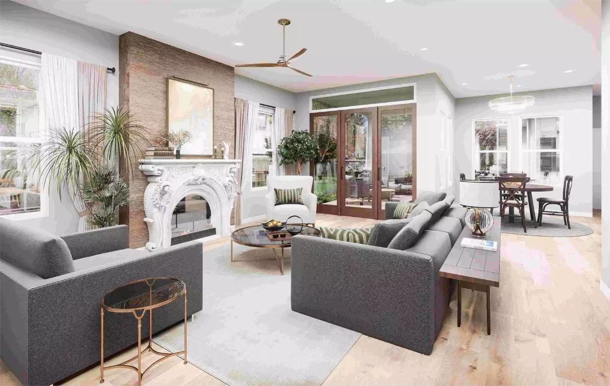 Ornate Fireplace Surround Holds Its Own Against Modern Gray Seating
