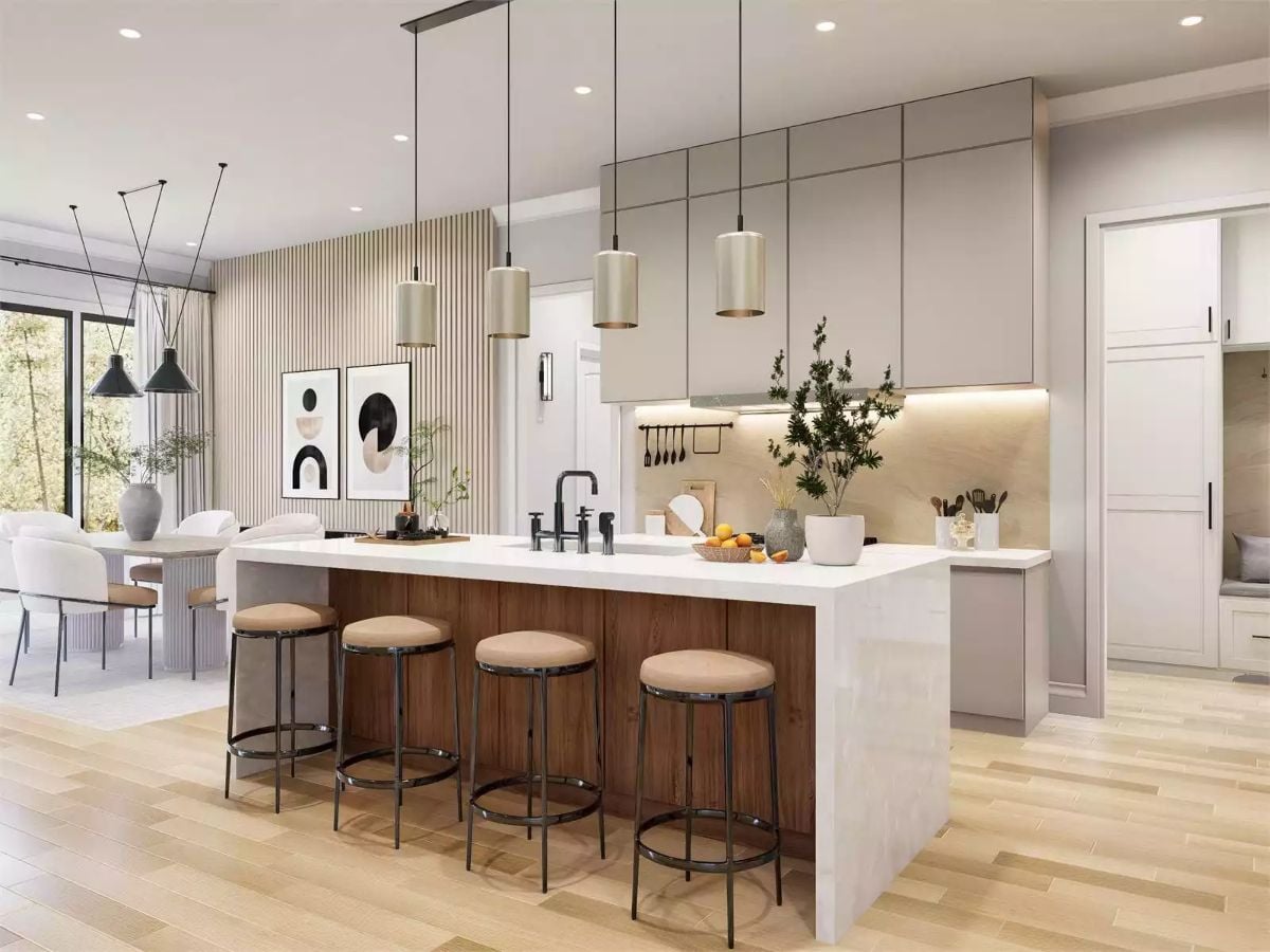 Warm Wood Island Base and Pendant Cylinders Make the Kitchen Worth Lingering In