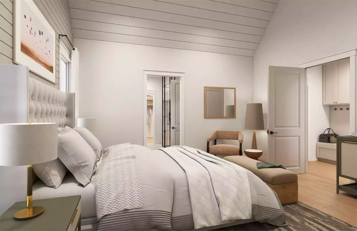 Vaulted Shiplap Ceiling and Tufted Headboard Set the Tone in the Primary Suite