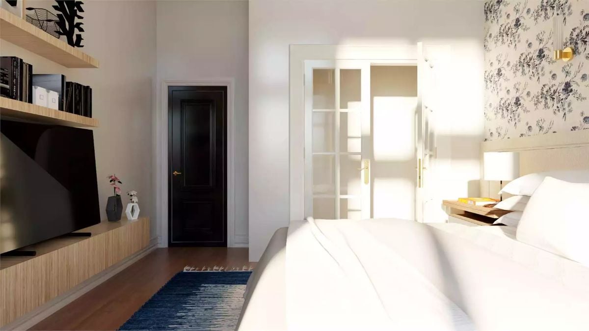 Black Door, White Bedding, and a Blue Rug Walk Into a Bedroom