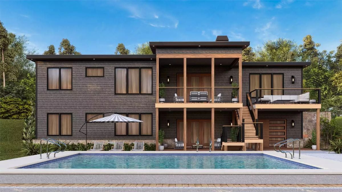 Dark Shingle Cladding and Wood Columns Frame a Backyard Worth Lingering In