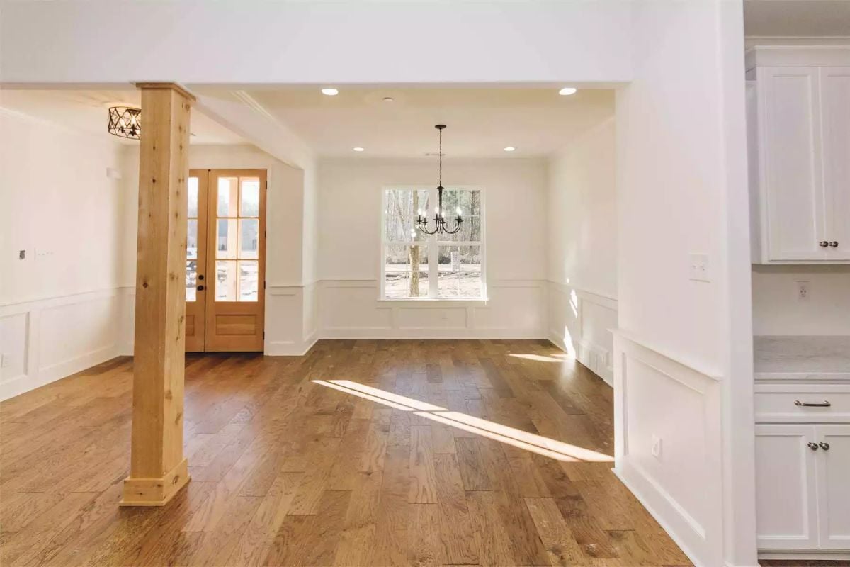 Craftsman Column and Wainscoting Set the Tone Before You Reach the Dining Room