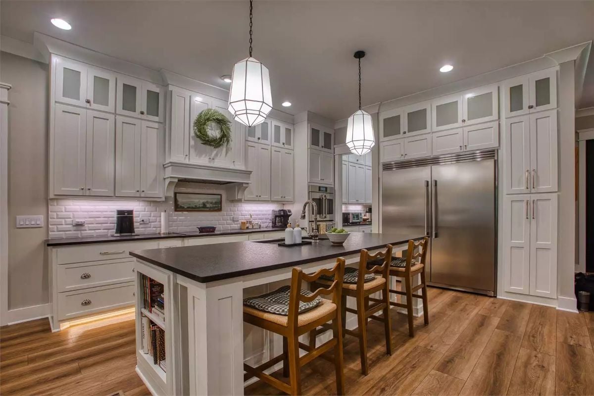 Bookshelf Island and Geometric Pendants Make This Kitchen Worth Lingering In