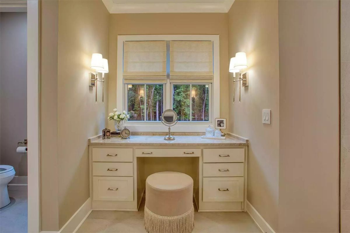 Fringe Stool and Sconce Lighting Make This Vanity Nook Feel Finished