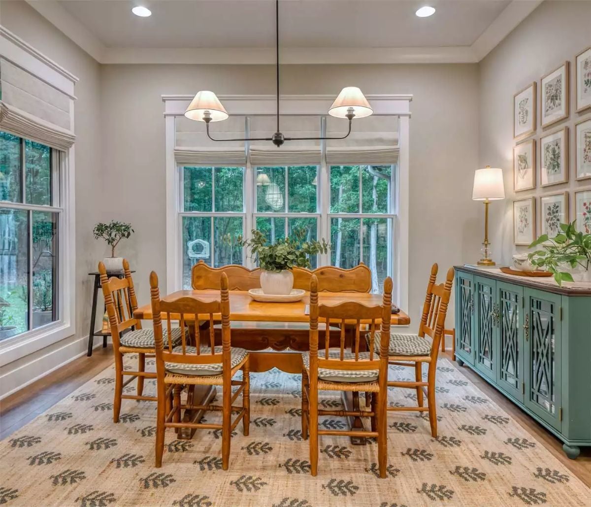 Rush Seats and a Teal Sideboard Keep the Dining Room Grounded