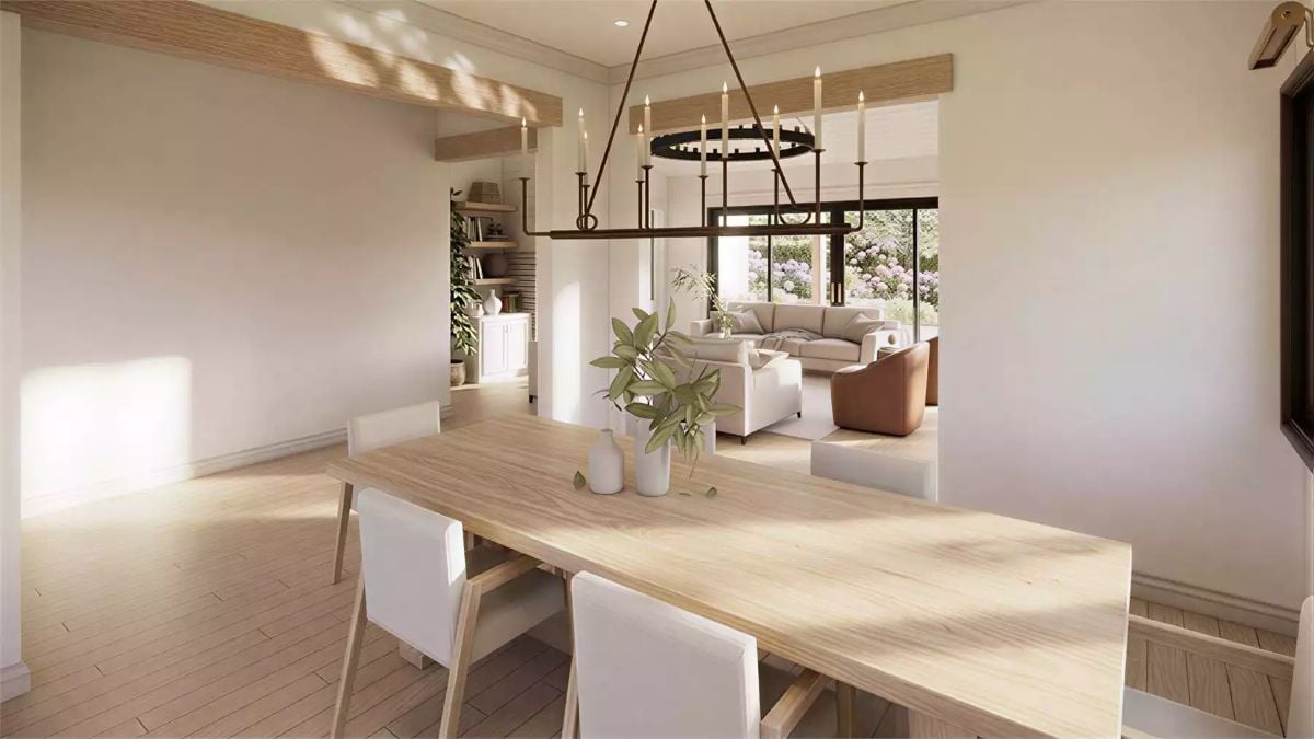 Candle-Ring Chandelier and Raw Wood Table Set a Quiet, Unhurried Tone