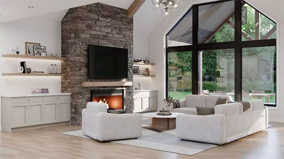 Floor-to-Ceiling Stone Fireplace Commands a Vaulted Great Room