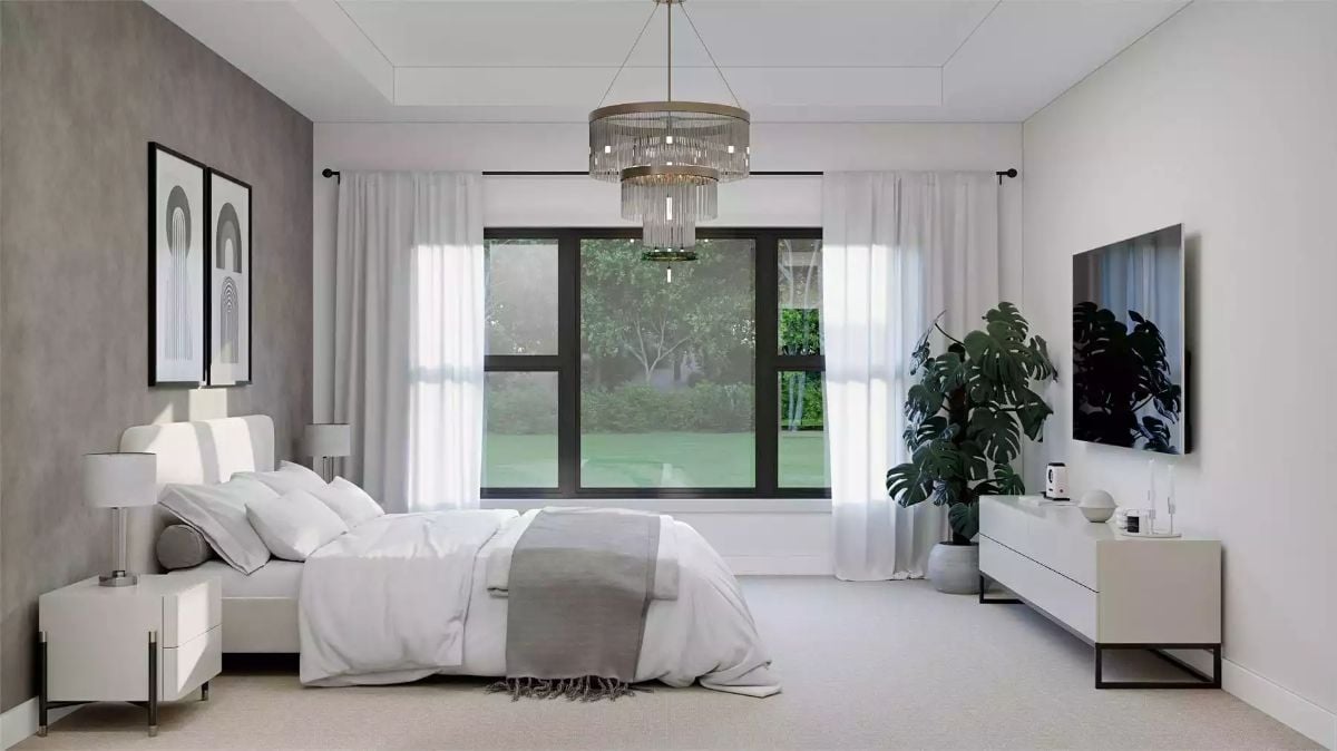 Layered Grays and a Crystal Chandelier Keep This Bedroom Grounded and Polished