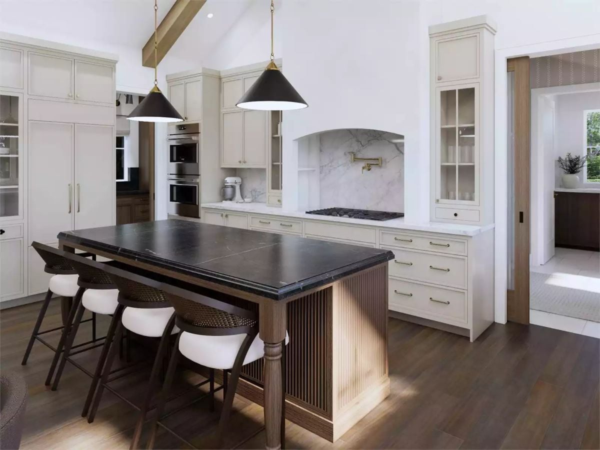 Soapstone Island and Brass Hardware Set the Tone in This Vaulted Kitchen