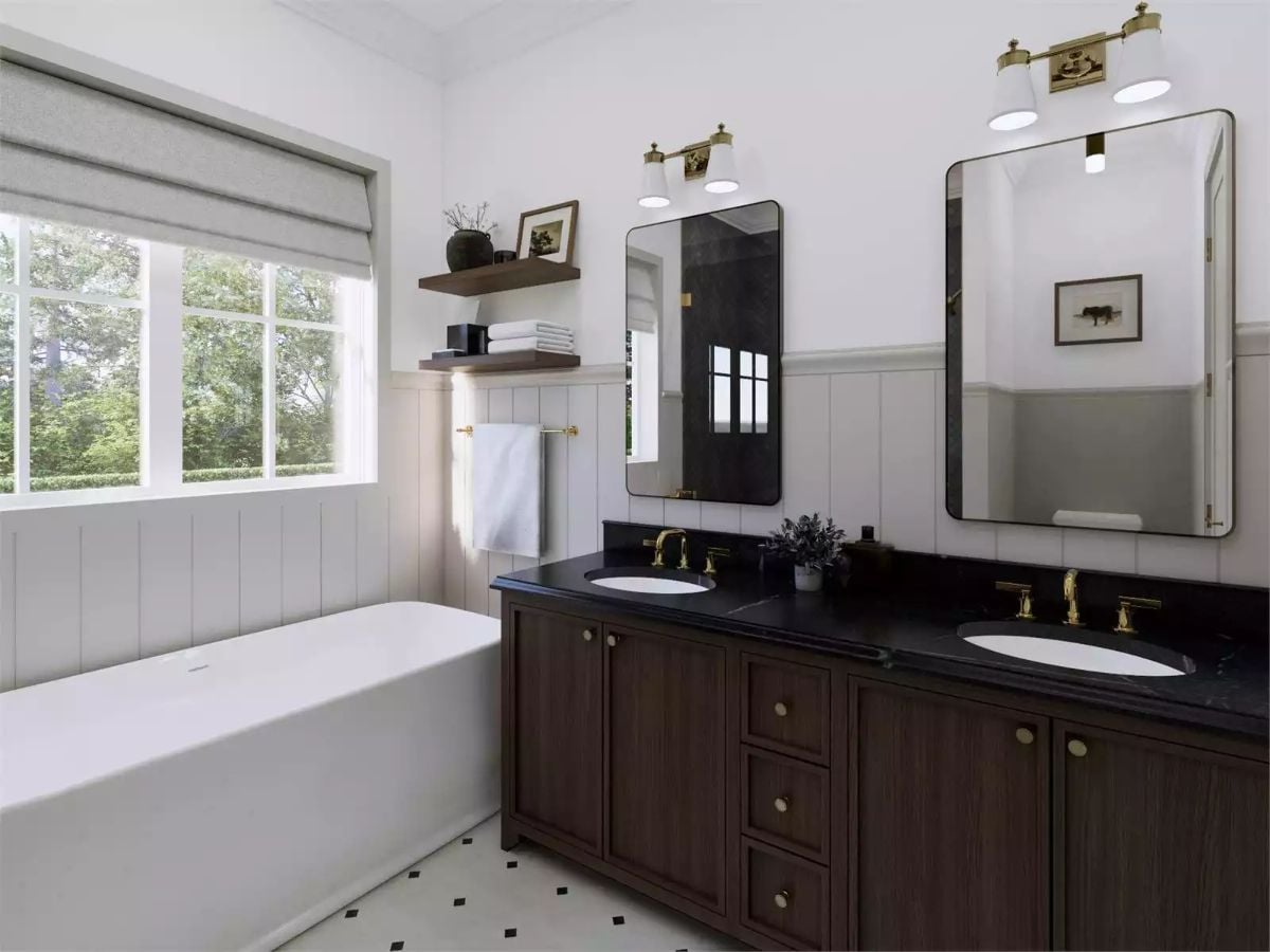 Dark Vanity, Brass Fittings, and a Soaking Tub That Earns Its Square Footage