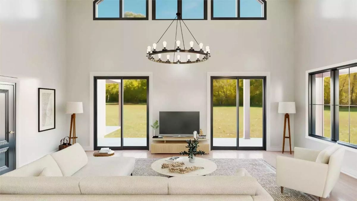 Soaring Ceilings and a Wagon Wheel Chandelier Set the Tone