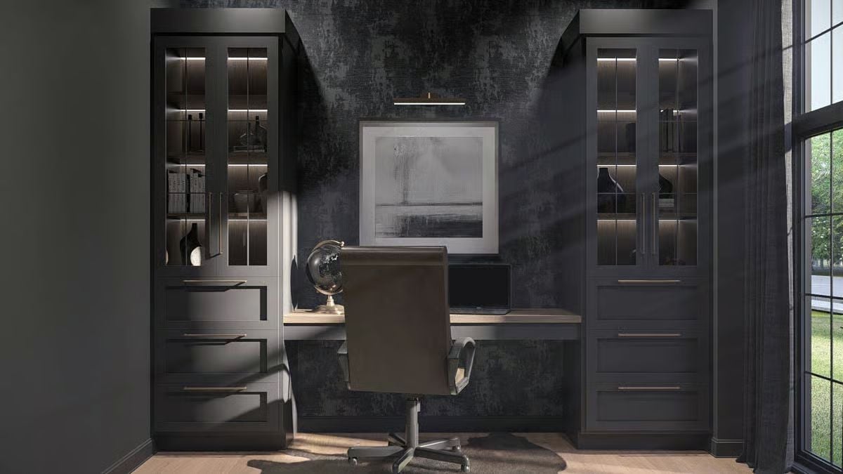 Built-In Glass Cabinets and a Globe on the Desk Signal a Serious Home Office