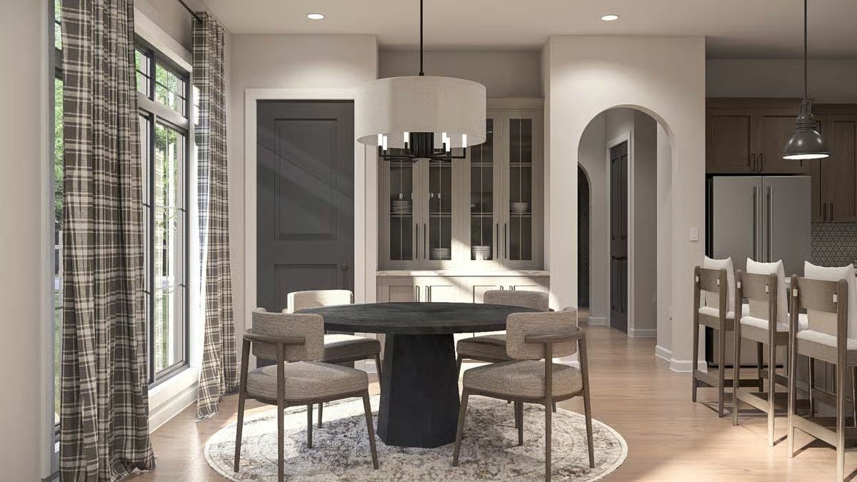 Round Table, Arched Passage, and a Drum Pendant That Pulls It All Together