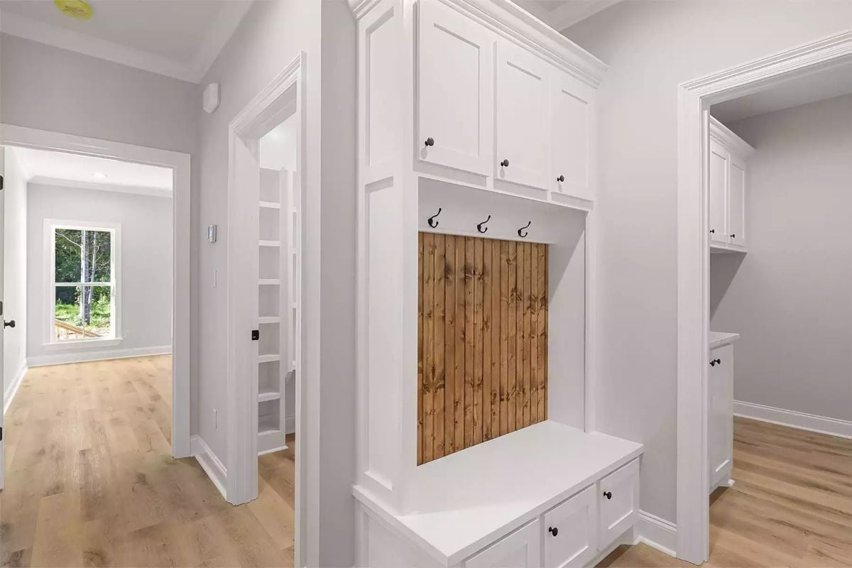 Shiplap Back Panel, Black Coat Hooks, and Upper Cabinets That Pull Real Weight