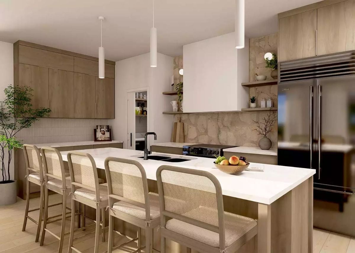 Warm Stone Backsplash and Open Shelving Give This Kitchen Real Personality