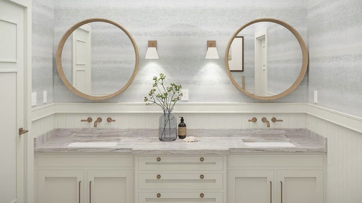 Double Round Mirrors and Wall-Mounted Faucets Make a Strong Case for Restraint