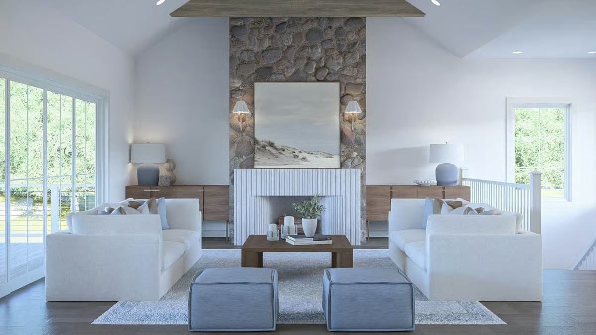 Rounded Stone Fireplace Wall and White Sofas Built for a Crowd