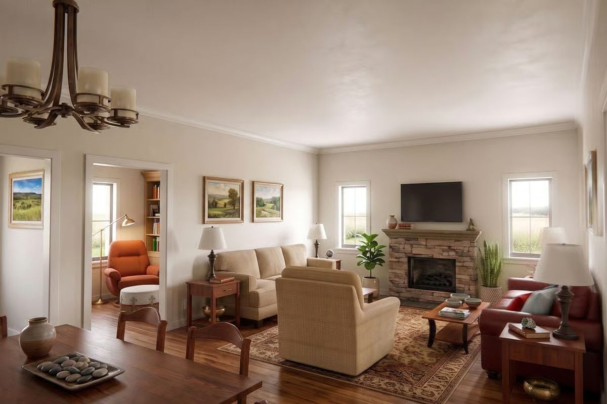 Stone Fireplace Anchors a Cream and Cognac Living Room Built for Real Life