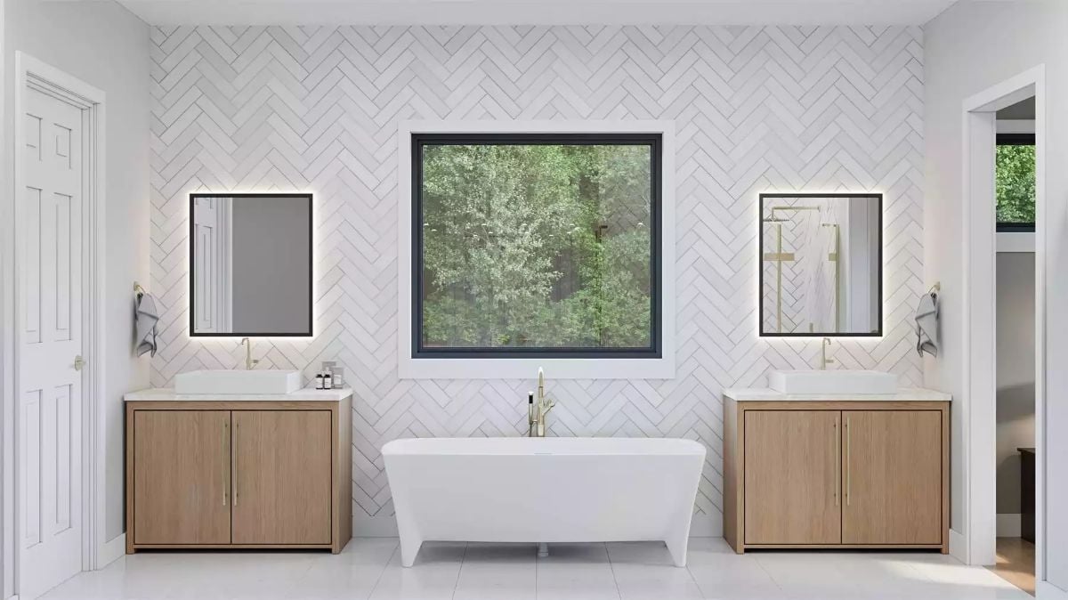 Dual Vanities Flanking a Freestanding Tub With a Tree View That Earns Its Place