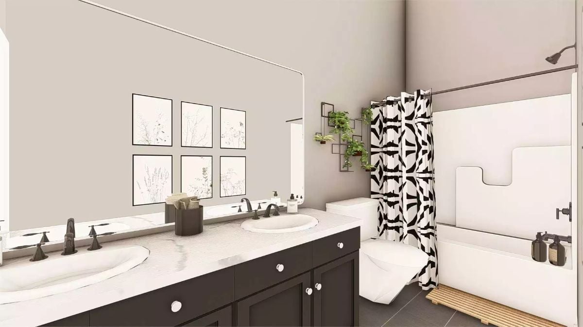 Bold Curtain Pattern and Marble Counters in a Double-Sink Bath