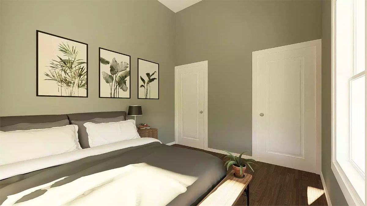 Olive Walls and Botanical Art Ground a Bedroom Built for Rest