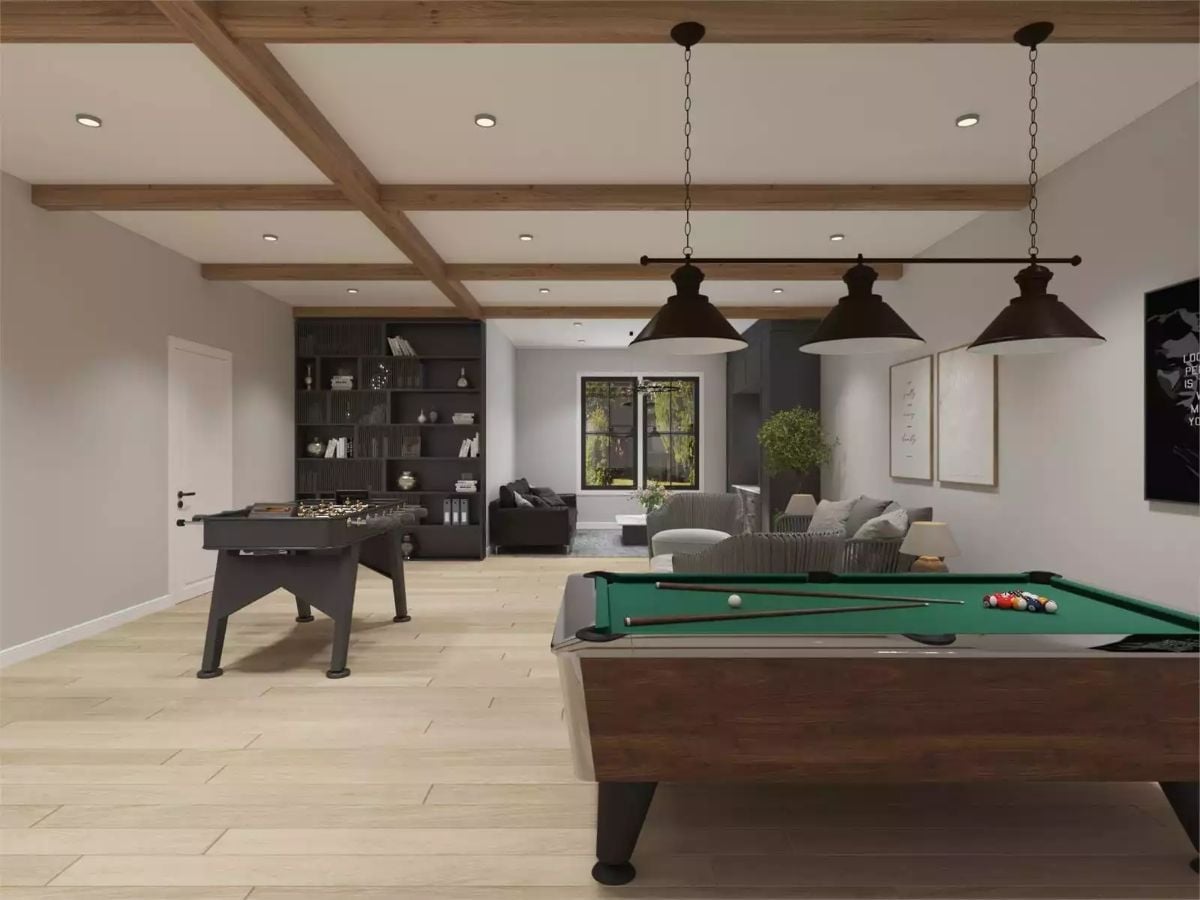 Foosball, Pool, and a Lounge Corner Make One Room Do a Lot of Work