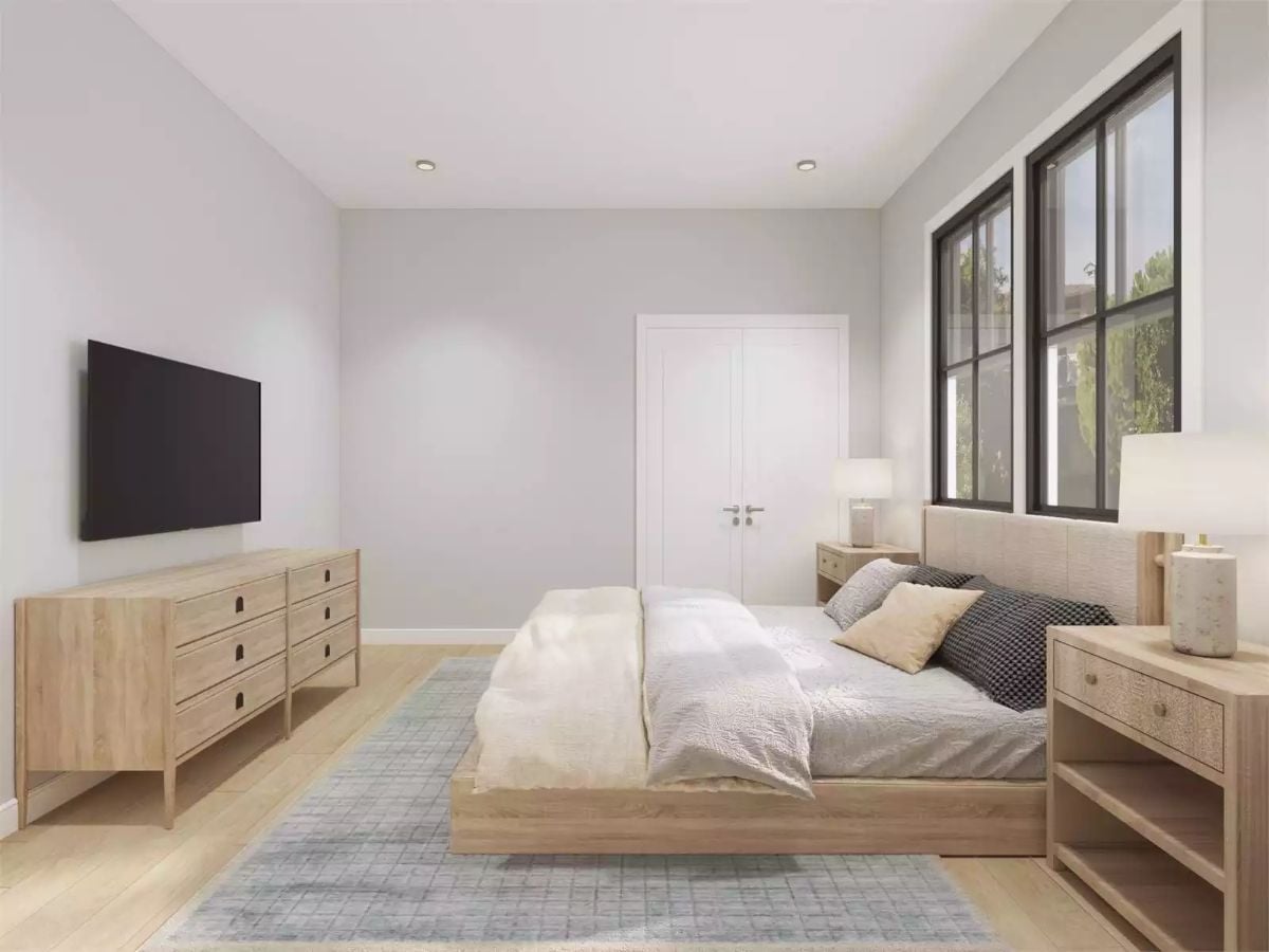 Light Wood and Linen Tones Make a Bedroom Feel Like Rest Is the Point