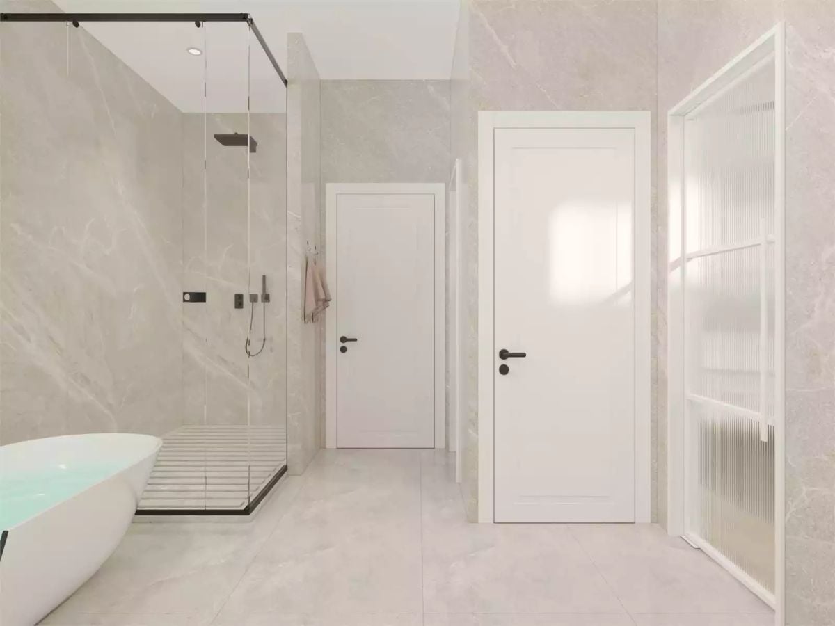 Marble Walls and a Freestanding Tub Make a Case for Slowing Down