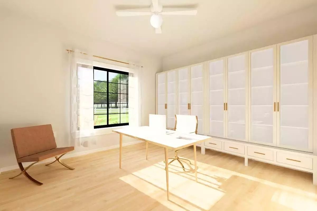 Gold Hardware and Floor-to-Ceiling Storage Define This Sun-Filled Home Office