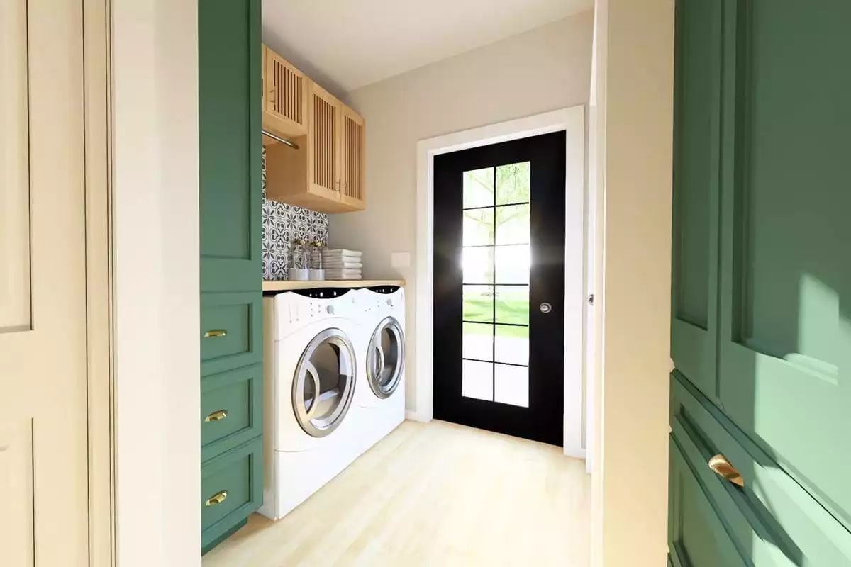 Green Cabinets and a Grid-Pane Door Make This Laundry Room Worth Noticing