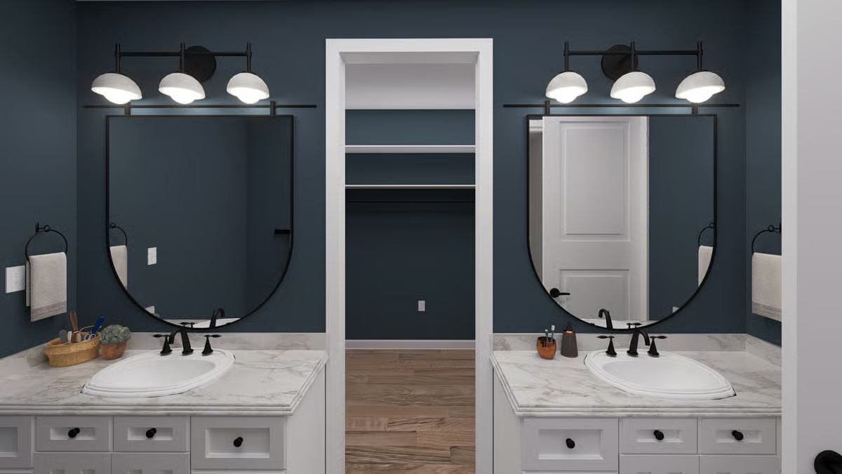 Matching Vanities and Black Hardware Make Sharing a Bathroom Feel Intentional
