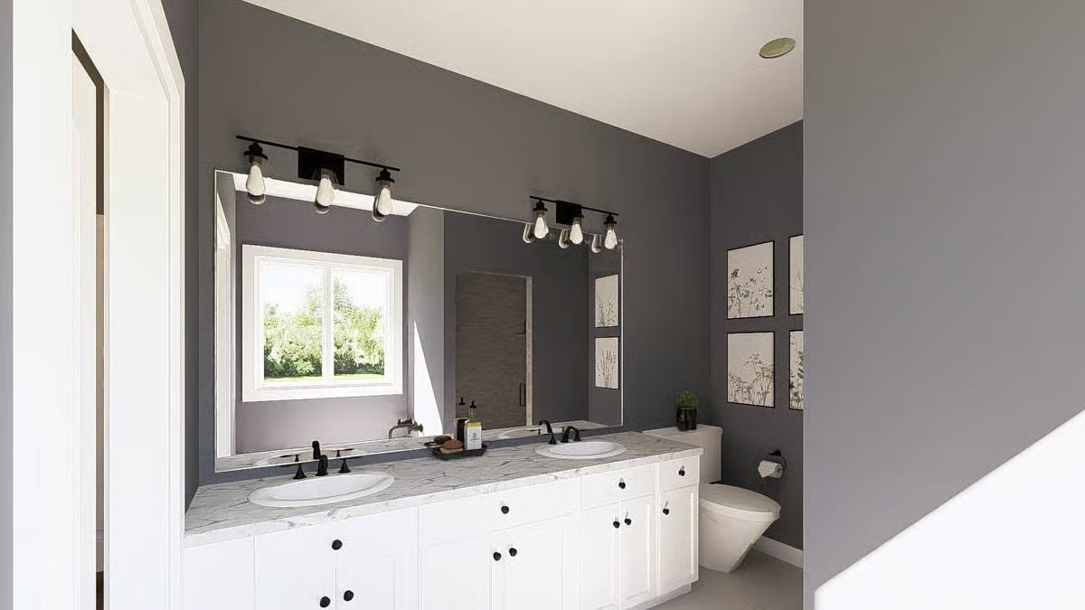 Matte Black Fixtures Against Marble Pull Double Duty on a Double Vanity