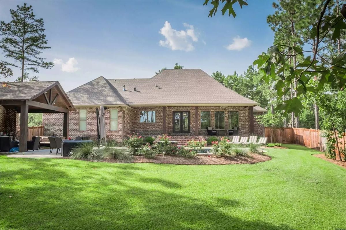 Brick Exterior and Covered Patio Built for Backyard Gatherings
