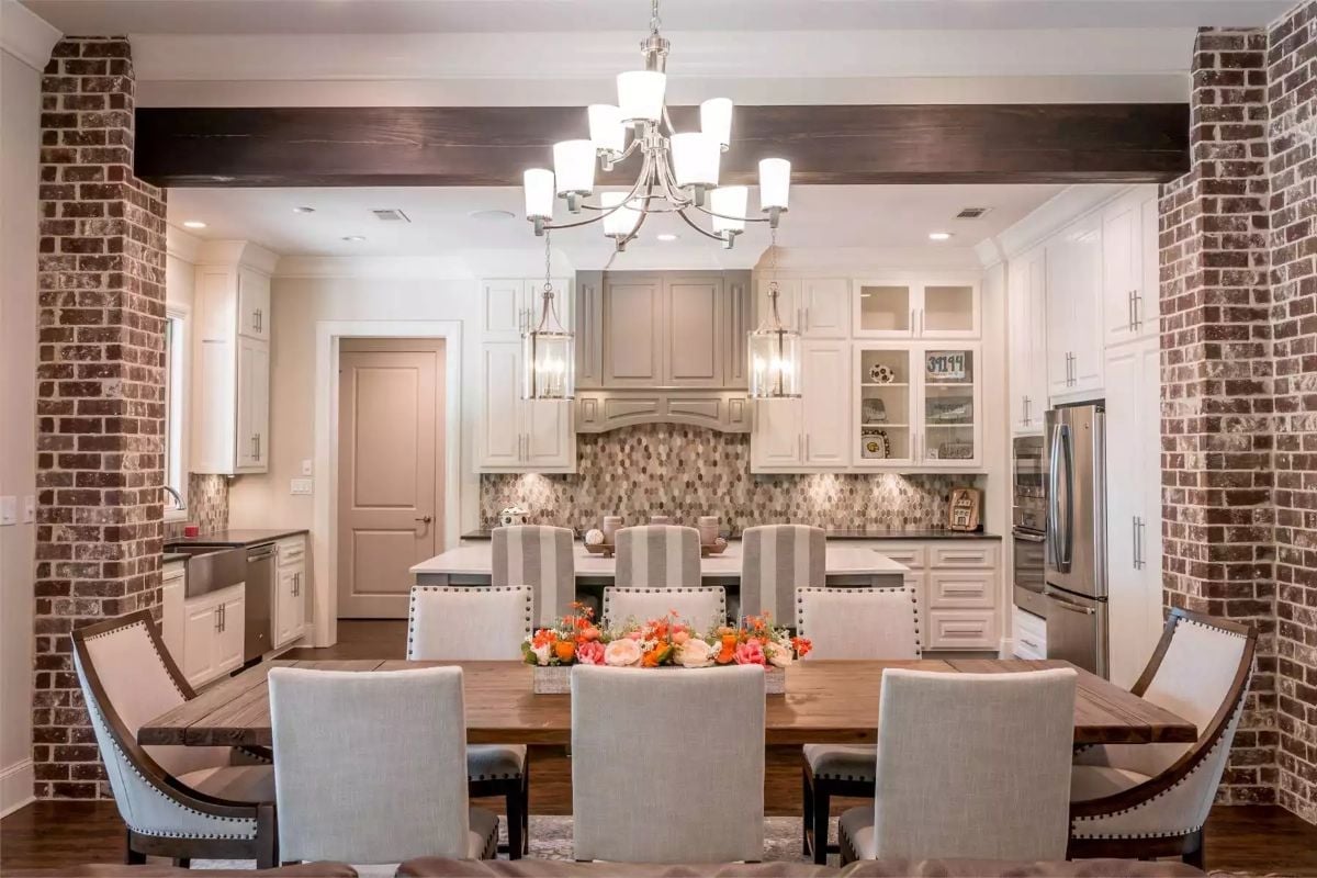 Exposed Brick Columns Frame a Kitchen Built for Feeding a Crowd