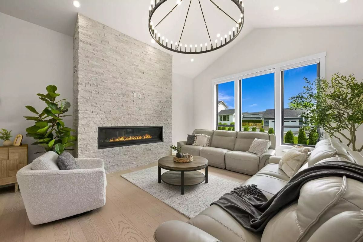 Floor-to-Ceiling Stacked Stone Makes the Fireplace Impossible to Ignore