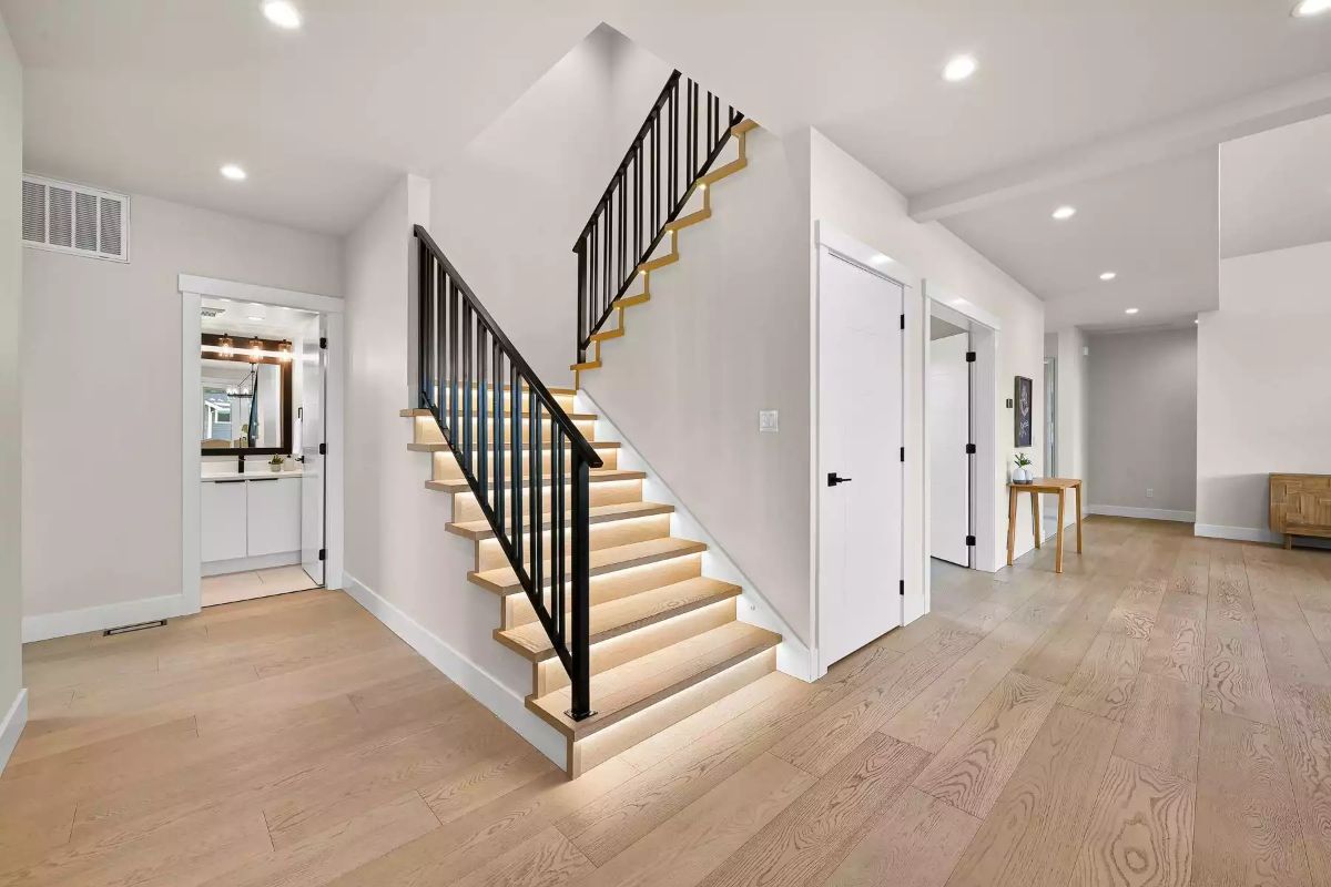 Stair Lighting at the Riser Level Pulls Off Something Most Builders Skip