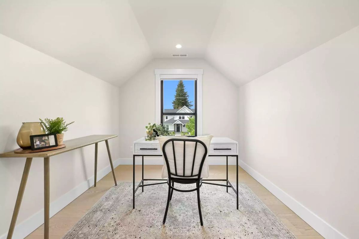 Vaulted Home Office Tucked Into the Roofline With a View Worth the Commute