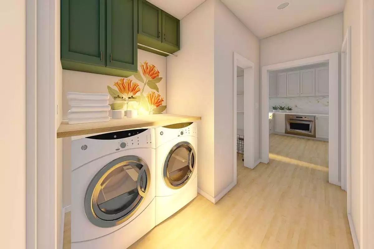 Green Cabinets and a Folding Counter Keep This Laundry Room Honest