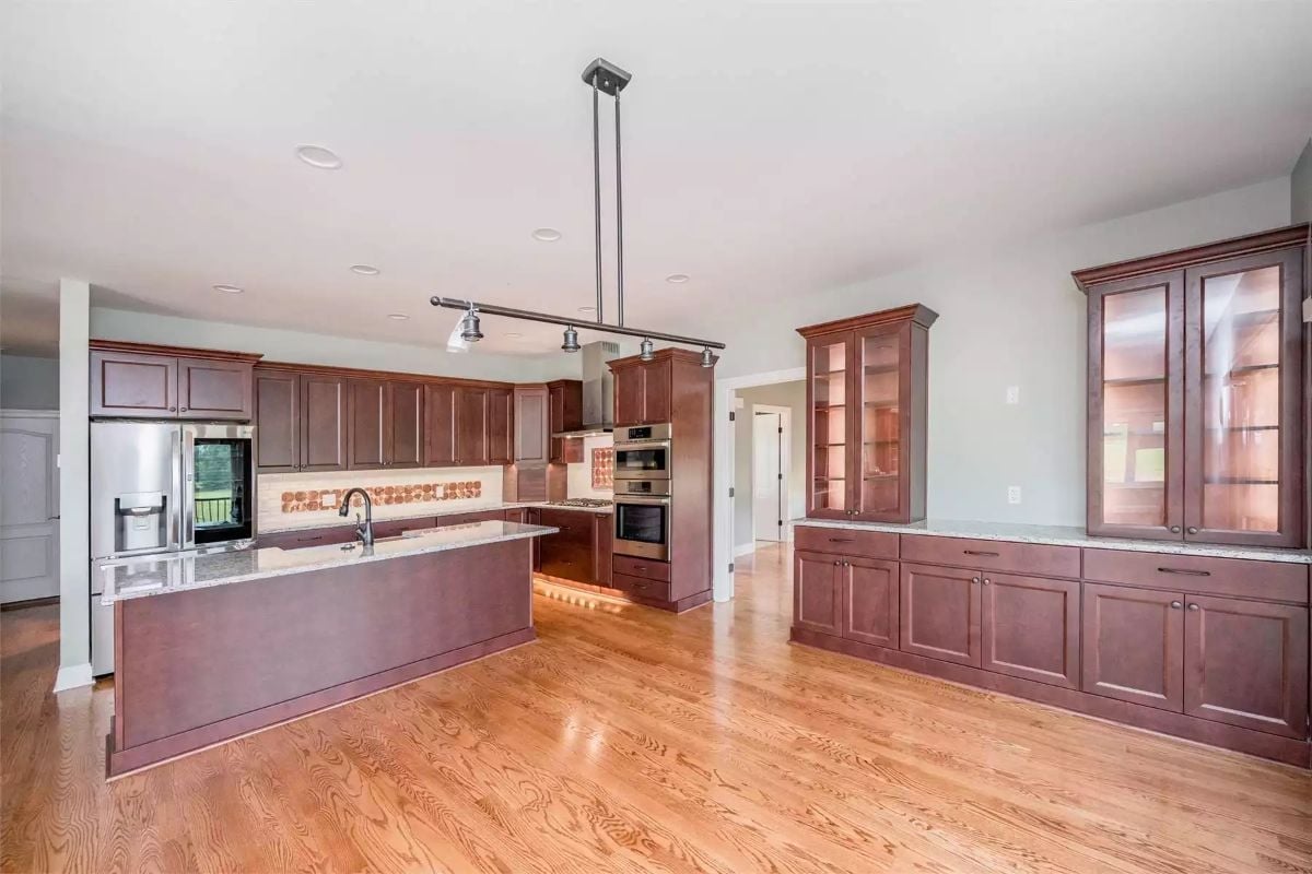 Cherry Cabinets and Under-Island Lighting Make This Kitchen Hard to Walk Past