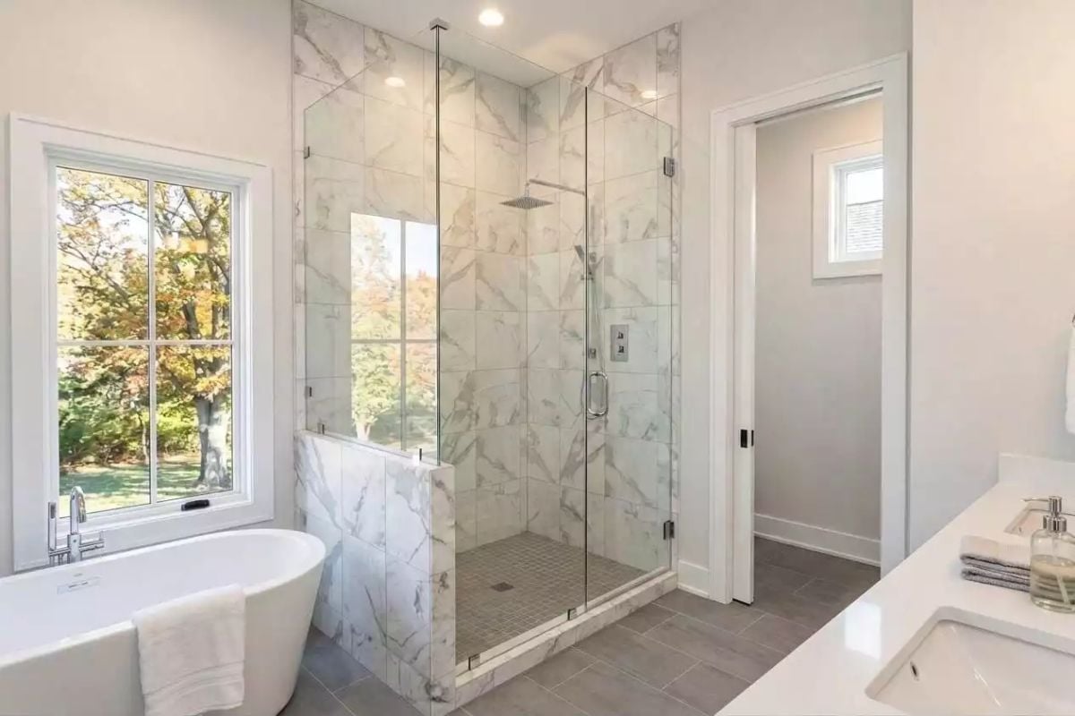 Marble Shower Walls and a Freestanding Tub That Don't Fight Each Other