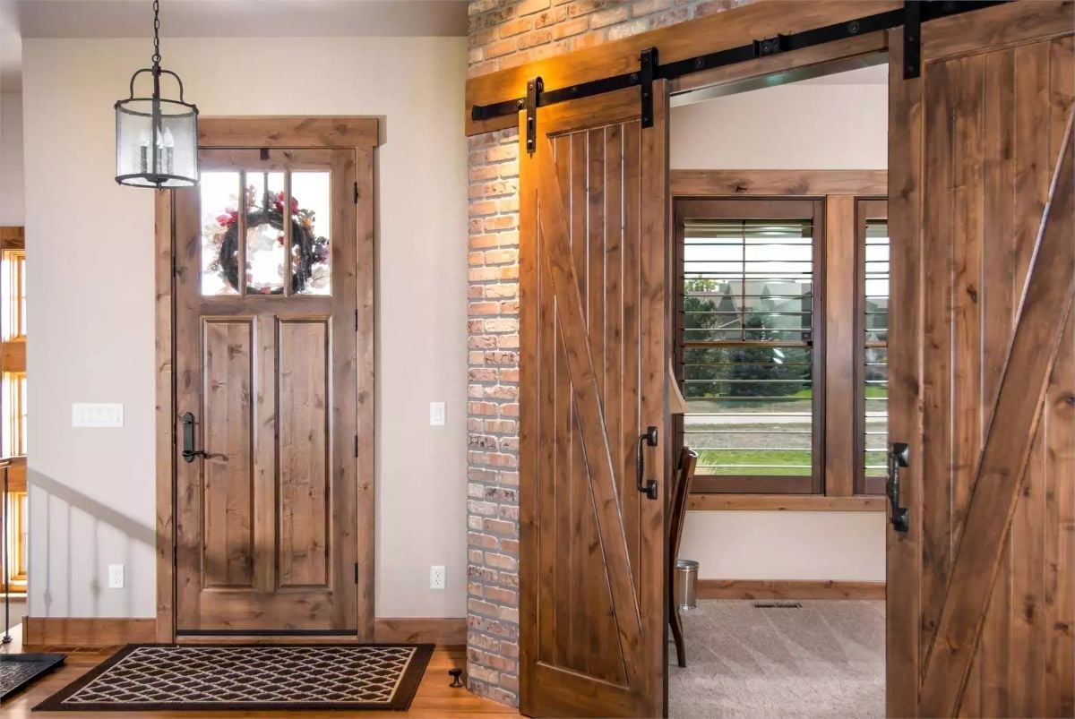 Barn Door Hardware and Brick Make a Strong Case for Rustic Done Right