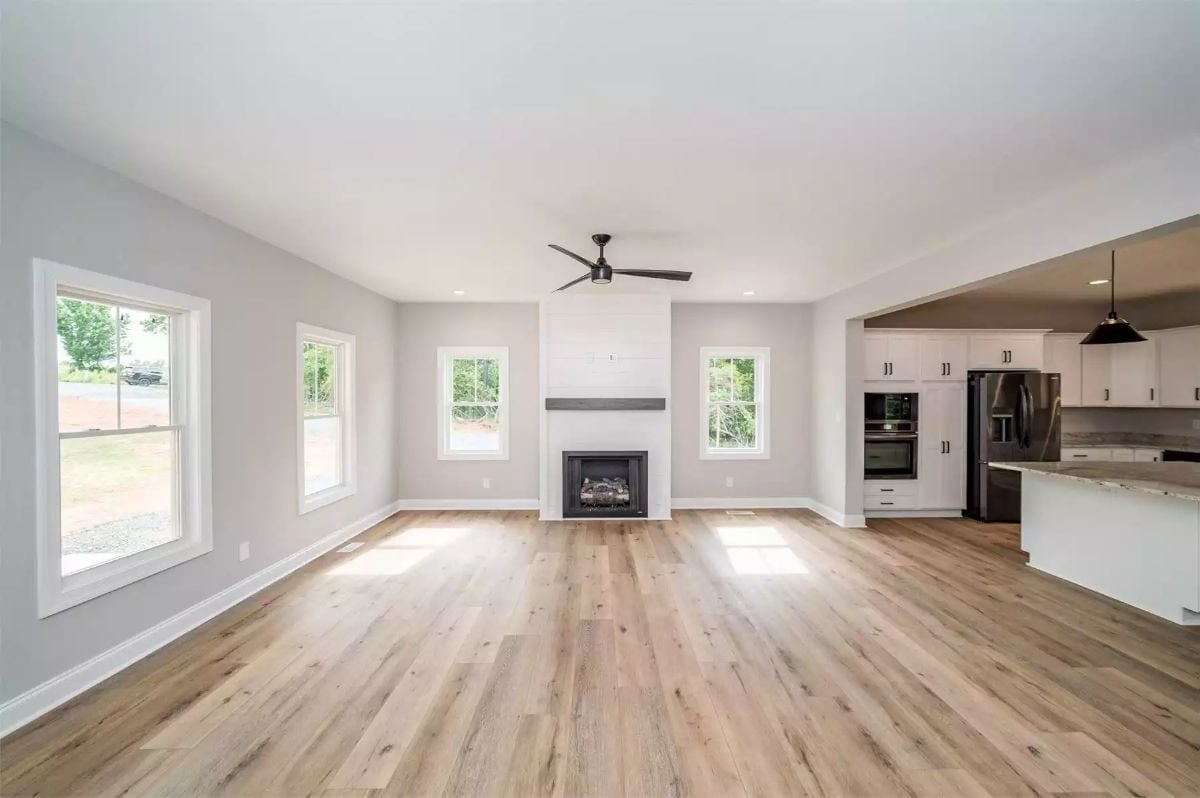 Shiplap Fireplace Wall and Wide-Plank Floors Before the Furniture Moves In