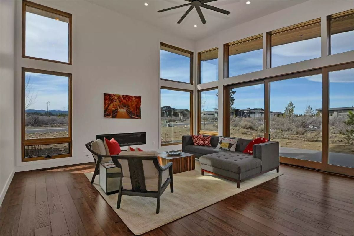 Double-Height Glass Corner Where the Desert Earns Its Place Inside