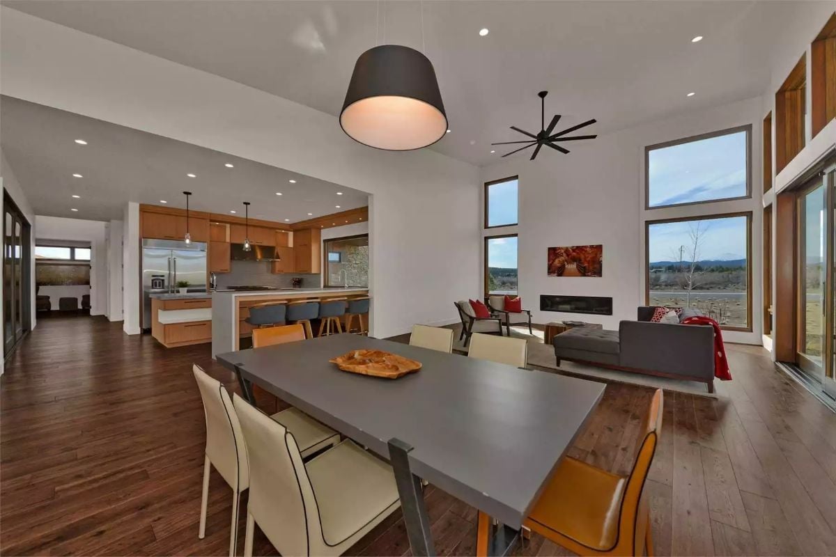 Pendant, Fan, and a Kitchen That Doesn't Hide Behind the Dining Room