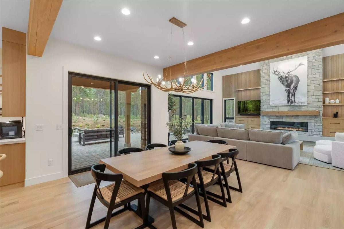 Antler Chandelier, Big Table, and Doors That Open to the Trees