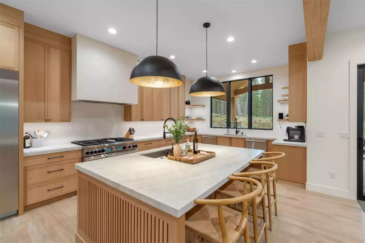 Dome Pendants, Fluted Island, and Wishbone Chairs That Pull the Whole Room Together
