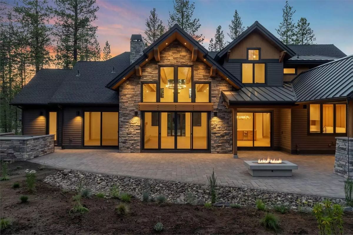 Stone, Glass, and a Fire Pit That Earns Its Place on the Patio