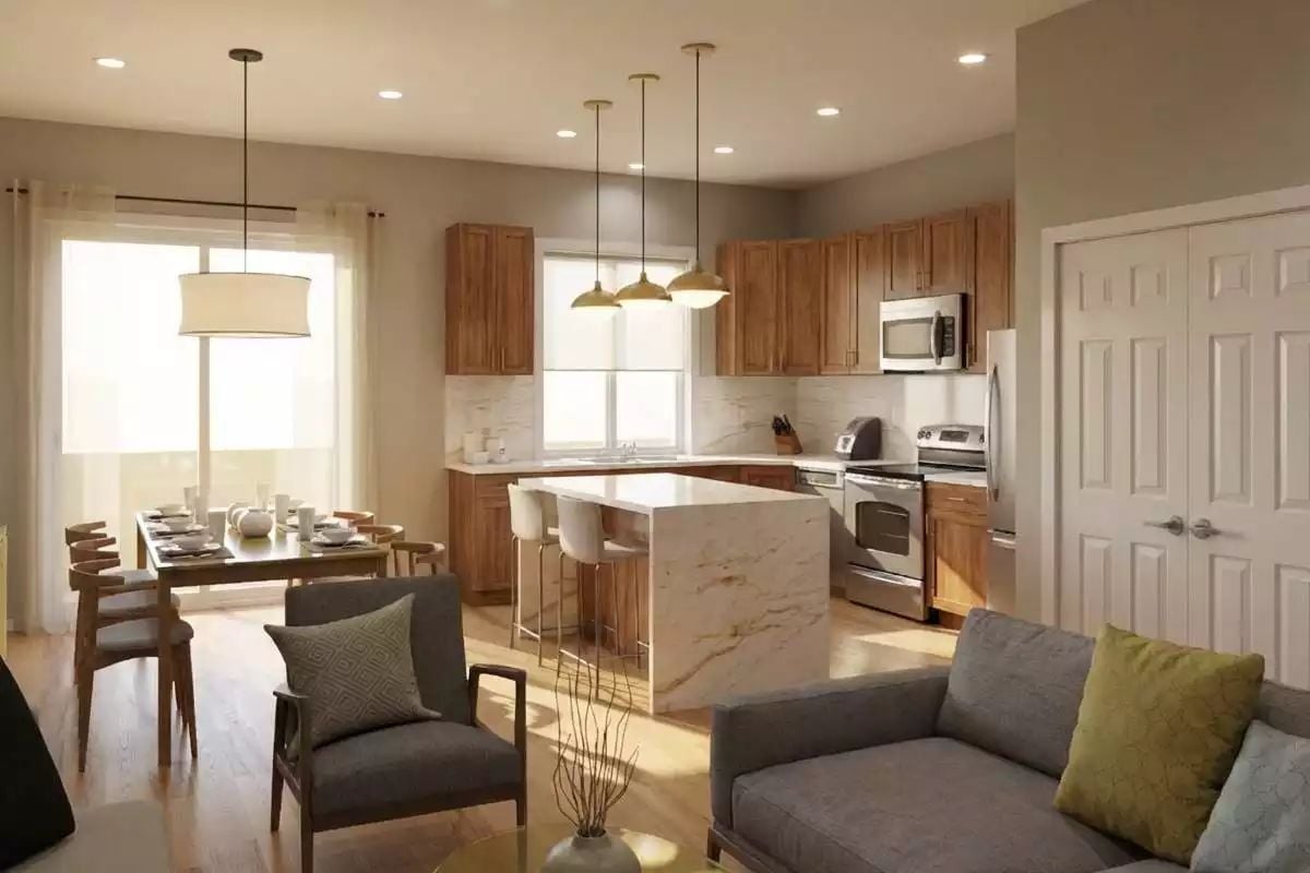 Marble Island, Warm Cabinets, and Pendant Lights That Pull It Together