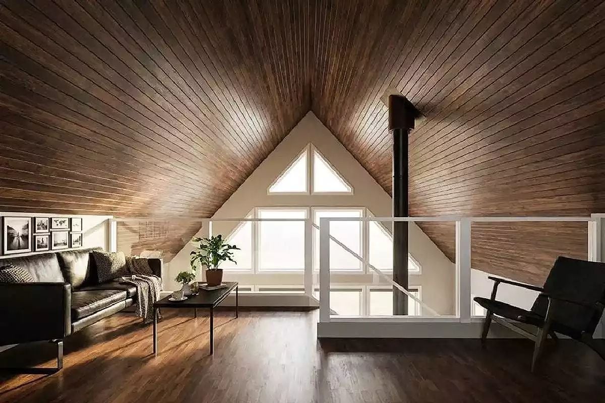 Loft Living With a Wood Stove Pipe and Triangle Windows That Earn Their Keep